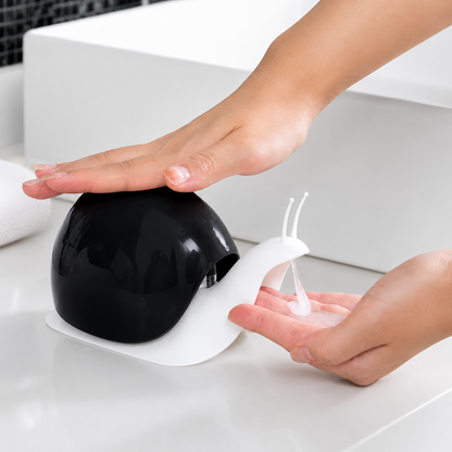 Cartberry black snail shape soap dispenser in use